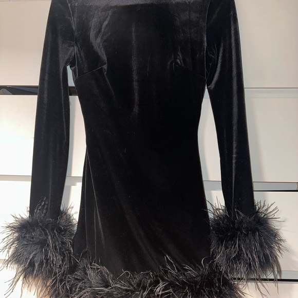 House of CB black velvet mini dress with feathers on cuffs and bottom - Picture 4 of 5